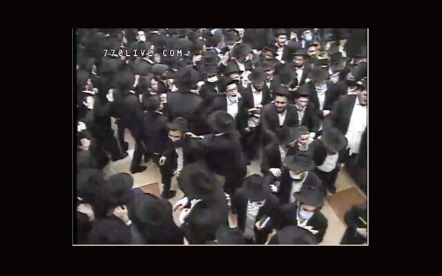 Worshipers dance late into the night at Chabad headquarters at 770 Eastern Parkway in Brooklyn after Selichot services early on Sunday, September 13, 2020. (Screenshot from livestream/via JTA) Worshipers dance late into the night at Chabad headquarters at 770 Eastern Parkway in Brooklyn after Selichot services early on Sunday, September 13, 2020. (Screenshot from livestream/via JTA)