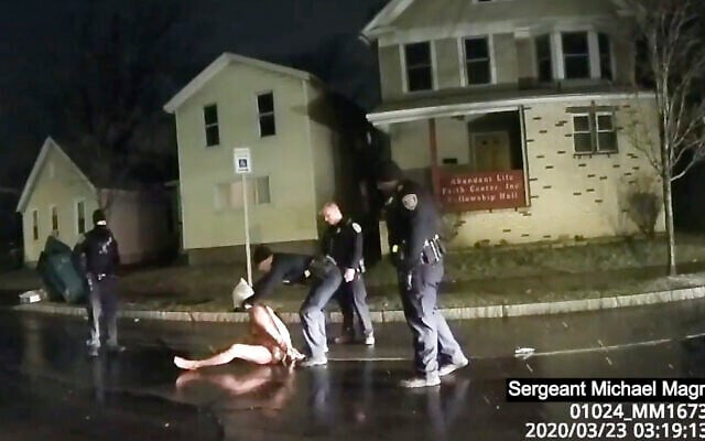 In this image taken from police body camera video provided by Roth and Roth LLP, a Rochester police officer puts a hood over the head of Daniel Prude, on March 23, 2020, in Rochester, NY. (Rochester Police via Roth and Roth LLP via AP) In this image taken from police body camera video provided by Roth and Roth LLP, a Rochester police officer puts a hood over the head of Daniel Prude, on March 23, 2020, in Rochester, NY. (Rochester Police via Roth and Roth LLP via AP)
