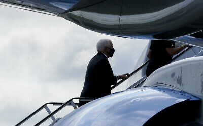 US Vice President Mike Pence boards Air Force Two after attending a ceremony marking the 19th anniversary of the 9/11 terrorist attacks at the National September 11 Memorial & Museum, September 11, 2020, in New York. (AP Photo/Mary Altaffer)