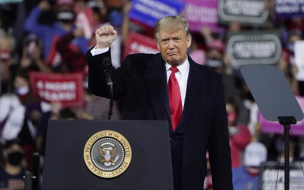 US President Donald Trump wraps up his speech at a campaign rally at Fayetteville Regional Airport, Saturday, Sept. 19, 2020, in Fayetteville, North Carolina. (AP Photo/Chris Carlson) US President Donald Trump wraps up his speech at a campaign rally at Fayetteville Regional Airport, Saturday, Sept. 19, 2020, in Fayetteville, North Carolina. (AP Photo/Chris Carlson)