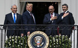 From left to right: Prime Minister Benjamin Netanyahu, US President Donald Trump, Bahrain Foreign Minister Abdullatif al-Zayani and United Arab Emirates Foreign Minister Abdullah bin Zayed al-Nahyan are seen on the Blue Room Balcony after signing the Abraham Accords during a ceremony on the South Lawn of the White House in Washington, September 15, 2020. (AP Photo/Alex Brandon)