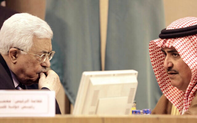 Palestinian Authority President Mahmoud Abbas, left, listens to Bahrain's then Foreign Minister Khalid bin Ahmed al-Khalifa during an emergency Arab League session at in Cairo, Egypt, May 28, 2016. (AP Photo/Amr Nabil) Palestinian Authority President Mahmoud Abbas, left, listens to Bahrain's then Foreign Minister Khalid bin Ahmed al-Khalifa during an emergency Arab League session at in Cairo, Egypt, May 28, 2016. (AP Photo/Amr Nabil)