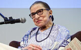 Late US Supreme Court Justice Ruth Bader Ginsburg speaks after the screening of "RBG," the documentary about her, in Jerusalem, July 5, 2018. (AP Photo/Caron Creighton, File)
