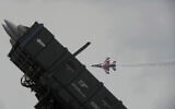 Illustrative: An F-16 fighter jet flies past the Rafael Advanced Defense Systems' SPYDER surface-to-air missile system, during a performance by the Singapore Air Force aerobatics team Black Knights at the Singapore Airshow in Singapore, February 14, 2014. (AP Photo/Joseph Nair)