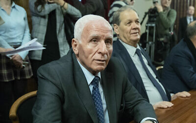 Fatah official Azzam Al-Ahmad, left, visits Moscow, Russia, Tuesday, Feb. 12, 2019. (AP Photo/Pavel Golovkin)