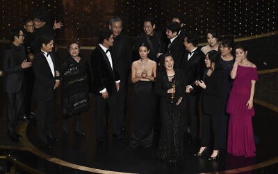 The cast and crew of 'Parasite' accept the award for best picture at the Oscars on Feb. 9, 2020, at the Dolby Theater in Los Angeles. (AP Photo/Chris Pizzello)