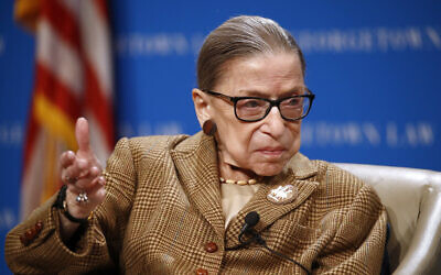 US Supreme Court Associate Justice Ruth Bader Ginsburg speaks during a discussion on the 100th anniversary of the ratification of the 19th Amendment at Georgetown University Law Center in Washington, Feb. 10, 2020. (AP Photo/Patrick Semansky)