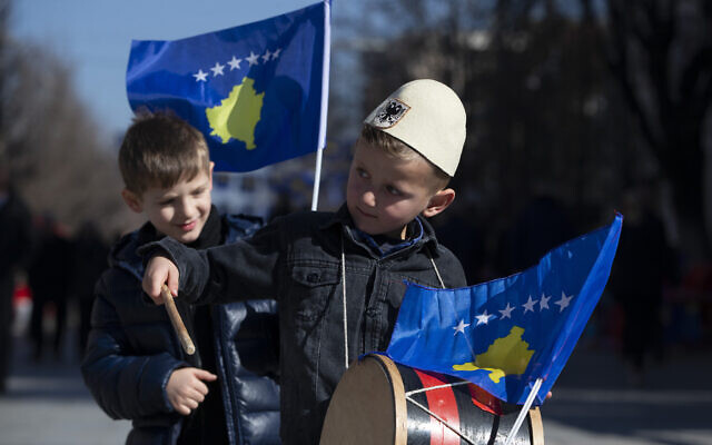 A boy plays on a drum decorated with Kosovo's flag to celebrate the 12th anniversary of the country's independence, in the capital Pristina, Monday, Feb. 17, 2020. (AP/Visar Kryeziu) A boy plays on a drum decorated with Kosovo's flag to celebrate the 12th anniversary of the country's independence, in the capital Pristina, Monday, Feb. 17, 2020. (AP/Visar Kryeziu)