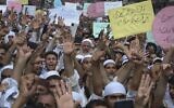 Illustrative: Pakistanis rally in support of Khalid Khan, who gunned down Tahir Naseem in courtroom, in Peshawar, Pakistan, Friday, July 31, 2020. Naseem, a US citizen, was standing trial on a charge of blasphemy. (AP Photo/Muhammad Sajjad)