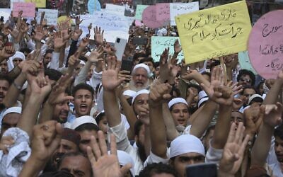 Illustrative: Pakistanis rally in support of Khalid Khan, who gunned down Tahir Naseem in courtroom, in Peshawar, Pakistan, Friday, July 31, 2020. Naseem, a US citizen, was standing trial on a charge of blasphemy. (AP Photo/Muhammad Sajjad)