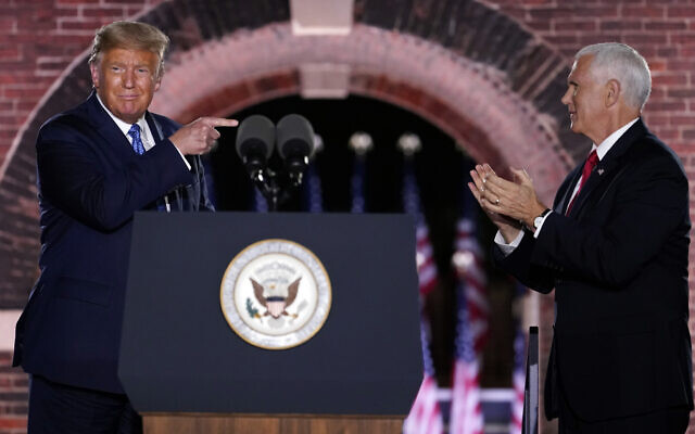 US President Donald Trump (left) joins Vice President Mike Pence on stage after Pence spoke on the third day of the Republican National Convention at Fort McHenry National Monument and Historic Shrine in Baltimore, August 26, 2020. (AP Photo/Andrew Harnik) US President Donald Trump (left) joins Vice President Mike Pence on stage after Pence spoke on the third day of the Republican National Convention at Fort McHenry National Monument and Historic Shrine in Baltimore, August 26, 2020. (AP Photo/Andrew Harnik)