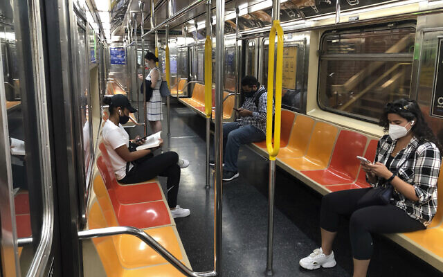 Illustrative: People in face masks ride the subway in Manhattan during the coronavirus pandemic, Aug. 27, 2020 in New York. (AP Photo/Ted Shaffrey) Illustrative: People in face masks ride the subway in Manhattan during the coronavirus pandemic, Aug. 27, 2020 in New York. (AP Photo/Ted Shaffrey)