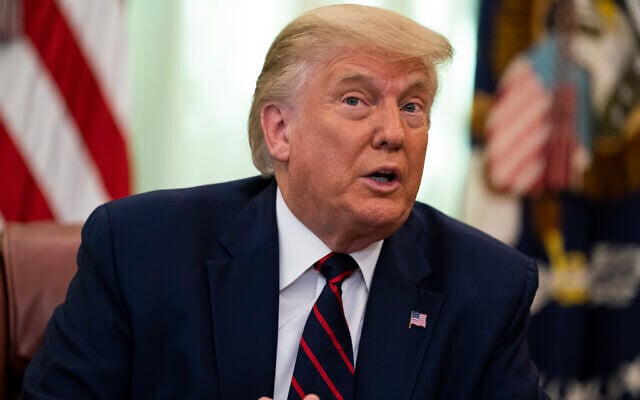 US President Donald Trump during a signing ceremony with Serbian President Aleksandar Vucic and Kosovar Prime Minister Avdullah Hoti, in the Oval Office of the White House, September 4, 2020, in Washington. (AP Photo/Evan Vucci) US President Donald Trump during a signing ceremony with Serbian President Aleksandar Vucic and Kosovar Prime Minister Avdullah Hoti, in the Oval Office of the White House, September 4, 2020, in Washington. (AP Photo/Evan Vucci)
