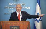 Prime Minister Benjamin Netanyahu speaks during a briefing on coronavirus development in Israel at his office in Jerusalem, September 13 2020. (Alex Kolomiensky/Yedioth Ahronoth via AP, Pool)