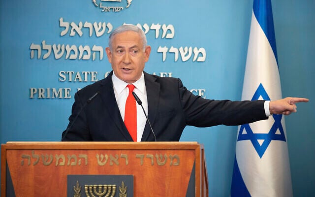 Prime Minister Benjamin Netanyahu speaks during a briefing on coronavirus development in Israel at his office in Jerusalem, September 13 2020. (Alex Kolomiensky/Yedioth Ahronoth via AP, Pool) Prime Minister Benjamin Netanyahu speaks during a briefing on coronavirus development in Israel at his office in Jerusalem, September 13 2020. (Alex Kolomiensky/Yedioth Ahronoth via AP, Pool)