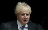 British Prime Minister Boris Johnson leaves 10 Downing Street in London, to attend the weekly Prime Minister's Questions at the Houses of Parliament, in London, September 16, 2020. (AP Photo/Matt Dunham)