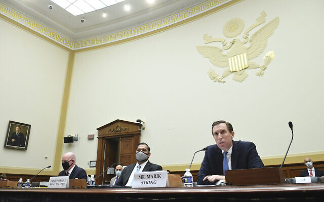 From left, R. Clarke Cooper, Assistant Secretary of State for Political-Military Affairs, Brian Bulatao, Under Secretary of State for Management, and Marik String, Acting Legal Adviser for the State Department, testify before a House Committee on Foreign Affairs hearing looking into the firing of State Department Inspector General Steven Linick, Wednesday, Sept. 16, 2020 on Capitol Hill in Washington. (Kevin Dietsch/Pool via AP) From left, R. Clarke Cooper, Assistant Secretary of State for Political-Military Affairs, Brian Bulatao, Under Secretary of State for Management, and Marik String, Acting Legal Adviser for the State Department, testify before a House Committee on Foreign Affairs hearing looking into the firing of State Department Inspector General Steven Linick, Wednesday, Sept. 16, 2020 on Capitol Hill in Washington. (Kevin Dietsch/Pool via AP)