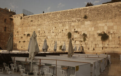 Capsules for up to 20 women to worship, a measure to curb the spread of the coronavirus, at the Western Wall in the Old City of Jerusalem, sit empty on Sept. 18, 2020, on the first day of a nationwide three-week lockdown in reaction to a resurgence in COVID-19 cases. (AP Photo/Maya Alleruzzo) Capsules for up to 20 women to worship, a measure to curb the spread of the coronavirus, at the Western Wall in the Old City of Jerusalem, sit empty on Sept. 18, 2020, on the first day of a nationwide three-week lockdown in reaction to a resurgence in COVID-19 cases. (AP Photo/Maya Alleruzzo)
