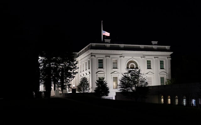 The flag at the White House flies at half-staff Sept. 18, 2020, in Washington, after the Supreme Court announced that Supreme Court Justice Ruth Bader Ginsburg has died of metastatic pancreatic cancer at age 87. (AP Photo/Alex Brandon)