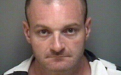 This undated booking file photo provided by the Albemarle-Charlottesville Regional Jail shows Christopher Cantwell, of New Hampshire. (Albemarle-Charlottesville Regional Jail via AP)