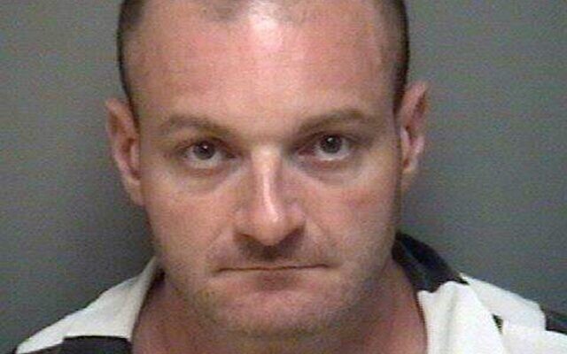 This undated booking file photo provided by the Albemarle-Charlottesville Regional Jail shows Christopher Cantwell, of New Hampshire. (Albemarle-Charlottesville Regional Jail via AP) This undated booking file photo provided by the Albemarle-Charlottesville Regional Jail shows Christopher Cantwell, of New Hampshire. (Albemarle-Charlottesville Regional Jail via AP)