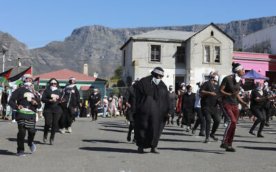 People dance to Jerusalema in Cape Town, South Africa, Sept. 24, 2020 (AP Photo/Nardus Engelbrecht)