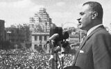 Gamal Abdel Nasser, president of Egypt, addresses a huge crowd gathered in Republic Square, Cairo, Feb. 22, 1958, from a balcony of the National Union building, after he was elected the first president of the United Arab Republic (AP Photo)