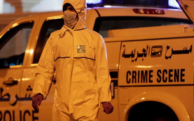 Illustrative: Police collect evidence at the scene where a police officer was killed in Karbabad Village, Bahrain, Saturday, April 16, 2016. (AP Photo/Hasan Jamali) Illustrative: Police collect evidence at the scene where a police officer was killed in Karbabad Village, Bahrain, Saturday, April 16, 2016. (AP Photo/Hasan Jamali)