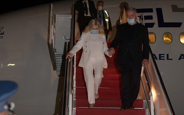 Prime Minister Benjamin Netanyahu and his wife Sara get off the plane at Andrews Air Force Base near Washington, DC, early on September 14, 2020, to sign normalization agreements at a White House ceremony with the United Arab Emirates and Bahrain. (Avi Ohayon / GPO) Prime Minister Benjamin Netanyahu and his wife Sara get off the plane at Andrews Air Force Base near Washington, DC, early on September 14, 2020, to sign normalization agreements at a White House ceremony with the United Arab Emirates and Bahrain. (Avi Ohayon / GPO)