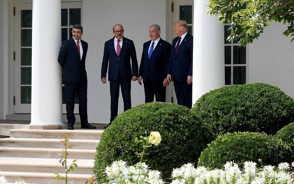 L-R: UAE Foreign Minister Abdullah bin Zayed Al-Nahyan, Bahrain Foreign Minister Abdullatif al-Zayani, Israeli Prime Minister Benjamin Netanyahu and US President Donald Trump talk at the ceremony for the signing of the Abraham Accords, at the White House in Washington, DC, September 15, 2020. (Avi Ohayon / GPO) L-R: UAE Foreign Minister Abdullah bin Zayed Al-Nahyan, Bahrain Foreign Minister Abdullatif al-Zayani, Israeli Prime Minister Benjamin Netanyahu and US President Donald Trump talk at the ceremony for the signing of the Abraham Accords, at the White House in Washington, DC, September 15, 2020. (Avi Ohayon / GPO)