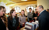 Illustrative: Defense Minister Naftali Bennett speaks during a visit at Midreshet Lindenbaum for Women in Jerusalem on February 16, 2020. (Gershon Elinson/Flash90)