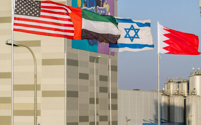 The flags of the U.S., United Arab Emirates, Israel and Bahrain seen on the side of a road in the city of Netanya, September 14, 2020. (Flash90)