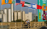 The flags of the US, the United Arab Emirates, Israel and Bahrain seen on the side of a road in Netanya, September 14, 2020. (Flash90)