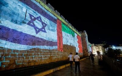 The flags of the US, United Arab Emirates, Israel and Bahrain are screened on the walls of Jerusalem's Old City, on September 15, 2020. (Yonatan Sindel/Flash90) The flags of the US, United Arab Emirates, Israel and Bahrain are screened on the walls of Jerusalem's Old City, on September 15, 2020. (Yonatan Sindel/Flash90)