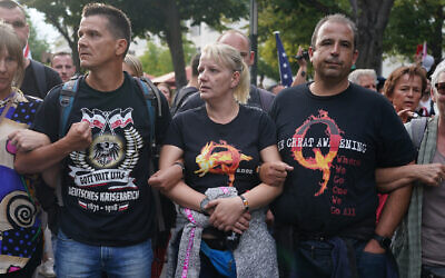 A group of Germans who follow the QAnon conspiracy theory protest in Berlin, August 29, 2020. (Sean Gallup/Getty Images via JTA)