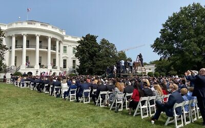 People seated whle awaiting the start of a ceremony for the signing of agreements between Israel and the UAE and Bahrain at the White House in Washington, DC, on September 15, 2020. (Jacob Magid/Times of Israel)