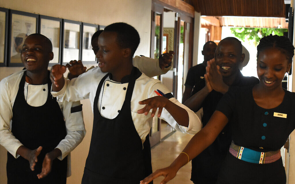 Employees of Heaven Retreat in Kigali perform a traditional Rwandan folk dance for new arrivals, February 2020. (Larry Luxner/Times of Israel)