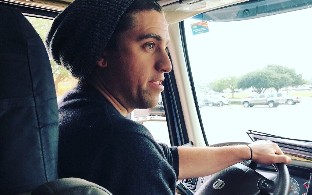 Christopher Haugh behind the wheel during one of his and Jordan Blashek's road trips. (Courtesy)
