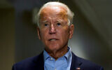 Democratic presidential candidate Joe Biden speaks about the death of Supreme Court Justice Ruth Bader Ginsburg after he arrives at New Castle Airport, in New Castle, Delaware, September 18, 2020. (AP Photo/Carolyn Kaster)