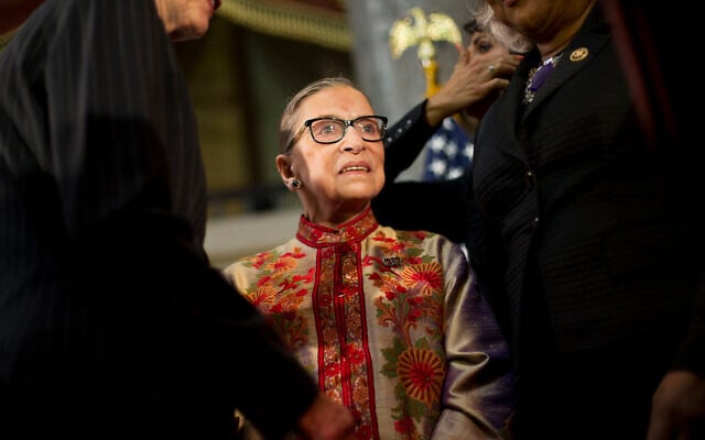 Justice Ruth Bader Ginsburg is greeted on stage by members of congress and their staffs during an annual Women's History Month reception at Statuary Hall on Capitol Hill in Washington, March 18, 2015. (AP Photo/Pablo Martinez Monsivais) Justice Ruth Bader Ginsburg is greeted on stage by members of congress and their staffs during an annual Women's History Month reception at Statuary Hall on Capitol Hill in Washington, March 18, 2015. (AP Photo/Pablo Martinez Monsivais)
