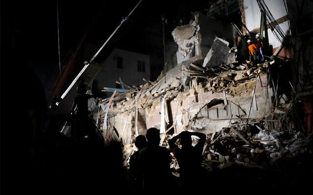 Lebanese and Chilean rescuers search a collapsed building in Beirut, Sept. 4, 2020. (AP Photo/Hussein Malla) Lebanese and Chilean rescuers search a collapsed building in Beirut, Sept. 4, 2020. (AP Photo/Hussein Malla)