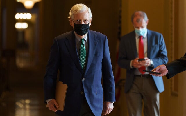 Senate Majority Leader Mitch McConnell of Kentucky walks to the Senate floor, September 14, 2020, on Capitol Hill in Washington. (AP Photo/Jacquelyn Martin) Senate Majority Leader Mitch McConnell of Kentucky walks to the Senate floor, September 14, 2020, on Capitol Hill in Washington. (AP Photo/Jacquelyn Martin)