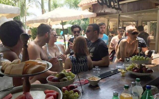 Employees of Liantech, the company behind Lbinary and Ivory Option, enjoying a poolside employee party on August 7, 2016 (Facebook)