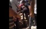 Attempts to rescue six Palestininans who fell into a cesspit in a southern West Bank village, September 26, 2020 (video screenshot)
