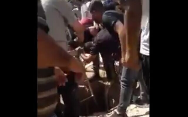Attempts to rescue six Palestininans who fell into a cesspit in a southern West Bank village, September 26, 2020 (video screenshot) Attempts to rescue six Palestininans who fell into a cesspit in a southern West Bank village, September 26, 2020 (video screenshot)