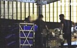 Workers at an industrial chicken farm secretly filmed violently handling birds that have been caged under a Ministry of Agriculture-approved pilot project. (Courtesy, Animals Now)