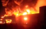 Illustrative: A fire breaks out in a factory outside of Tehran, Iran on September 22, 2020. (Screencapture/Twitter)