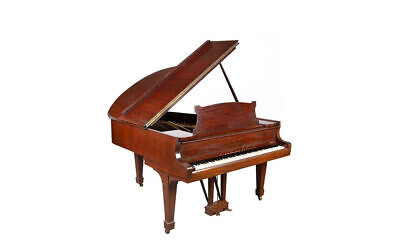 A piano that belonged to Władysław Szpilman is going up for auction. (Desa Uninicum via JTA)