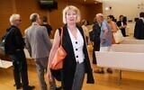 Claire Gimpel arrives in the Paris appeals court courtroom for the opening of a trial with members of her family, descendants of Jewish art collector Rene Gimpel, who filed suit against the state for restitution of three Andre Derain paintings looted during WWII in Paris; June 25, 2019. (Jacques DEMARTHON/AFP)