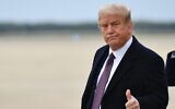 US President Donald Trump gives a thumbs up as he steps off Air Force One upon arriving at Andrews Air Force Base in Maryland on October 1, 2020. (Mandel Ngan/AFP)